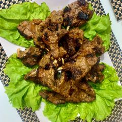 A picture of Grilled lemon and herb mutton chops.