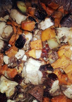 A picture of Roasted Pork Belly with Carmelized Vegetables.