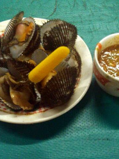A picture of Boiled Shellfish with Pinapple and Peanut Sauce.