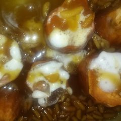 A picture of Momma's candied yams with almonds.