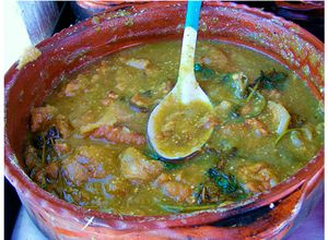 Una foto de Chicharron prensado en salsa verde