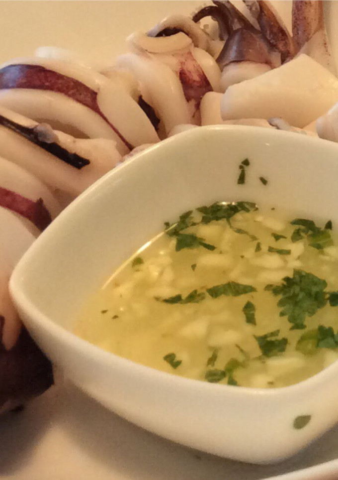 A picture of Squid with Dipping Sauce.