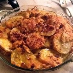 A picture of Layers Of Baked Potatoes.