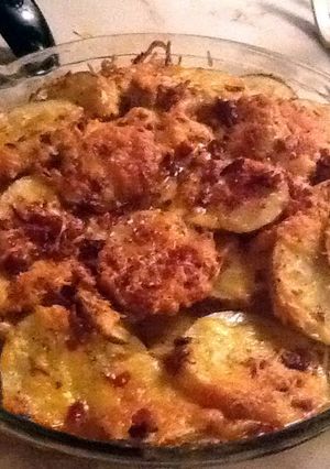 A picture of Layers Of Baked Potatoes.