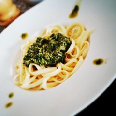 A picture of Bucati with pesto.