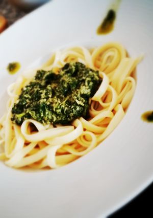 A picture of Bucati with pesto.