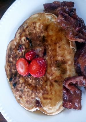 A picture of Strawberry Pancakes with Peanutbutter and Chocolate Chips..