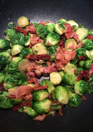 A picture of Brussel Sprouts with bacon.