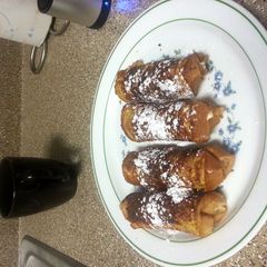 A picture of French toast roll up.