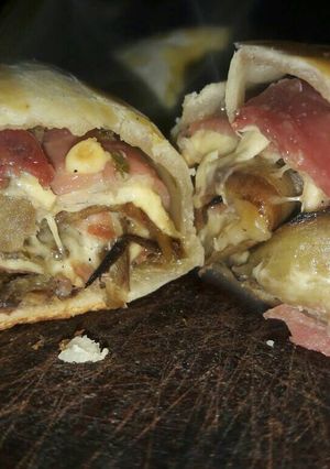 Una foto de Roll de berenjena y jamón crudo