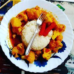 A picture of Gobhi sabzi with rice.
