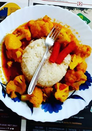 A picture of Gobhi sabzi with rice.