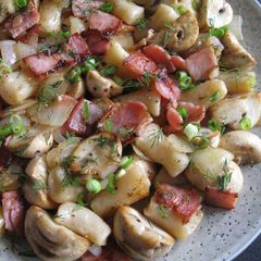 A picture of Ukrainian Dumplings with Bacon & Mushrooms.