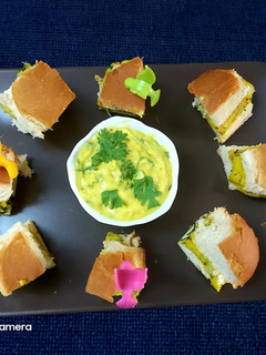 A picture of Masala pav served with besan chutney.