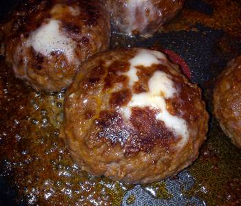 Unique Cuisine home made spicy burger with cheese centre Very Delicious