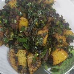A picture of Green onion potato sabzi.
