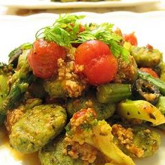 A picture of Okara Gnocchi with Tomato and Basil Sauce.