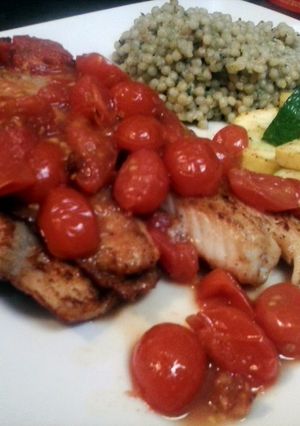 A picture of Tilapia with cherry tomato vinaigrette.