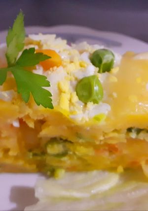 Una foto de Enrollado de causa rellena de verduras