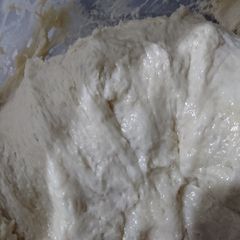 A picture of Pizza dough with egg.