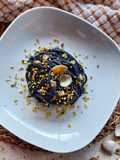 Spaghetti with Squid Ink, Clams, and Pistachios