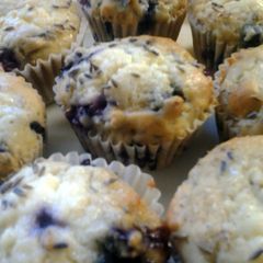 A picture of Lavender Almond Blueberry Muffins with Cream Cheese Filling.