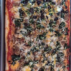 A picture of Italian Sausage & Spinach Rectangle Pizza.