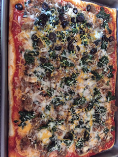 A picture of Italian Sausage & Spinach Rectangle Pizza.