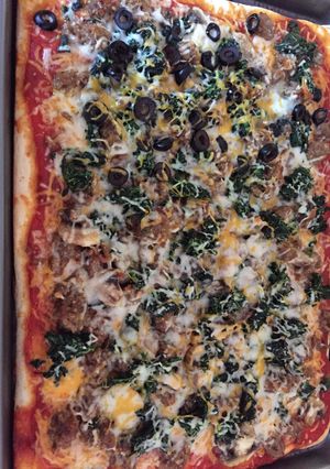 A picture of Italian Sausage & Spinach Rectangle Pizza.