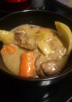 A picture of Beef stew with gravy.