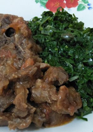 A picture of Beef wet fry with greens.