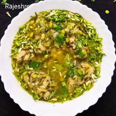 A picture of Methi Muthiya In Surti Papdi Gravy.