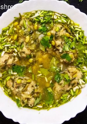 A picture of Methi Muthiya In Surti Papdi Gravy.