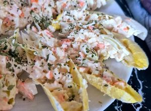 Une photo de Endives fraîcheur au surimi et sa salade croquante au fromage frais
