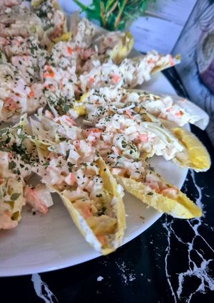 Une photo de Endives fraîcheur au surimi et sa salade croquante au fromage frais