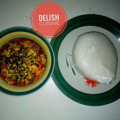 Egusi (melon soup) and semovita A picture of Egusi (melon soup) and semovita.