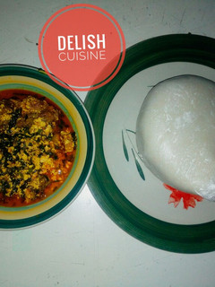 A picture of Egusi (melon soup) and semovita.