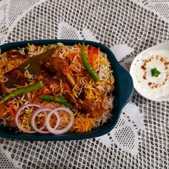 A picture of Mutton Biryani With Raita.