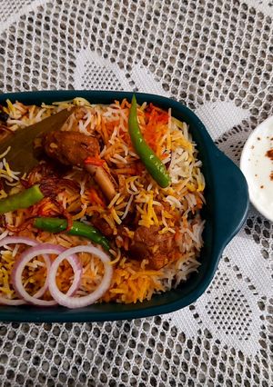 A picture of Mutton Biryani With Raita.