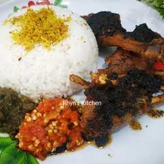 A picture of Bebek Ungkep Bumbu Hitam.