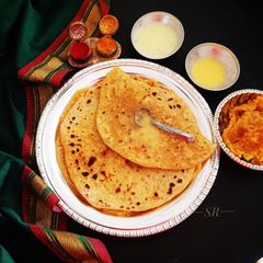 A picture of Mango Pooran poli(with mango and chana daal stuffing).