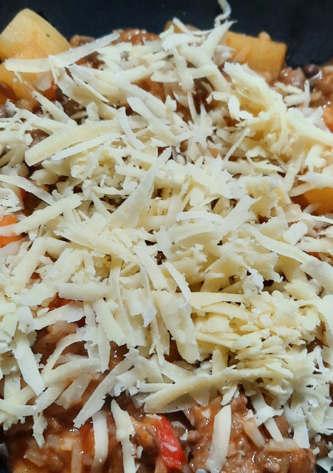 Una foto de Guiso de arroz y lentejas en disco de arado