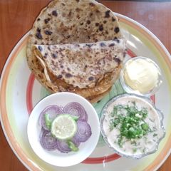 A picture of Stuffed white radish paratha (Punjabi mooli da paratha) 🧅🧄.