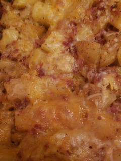 A picture of Cheesy bacon golden potatoes.