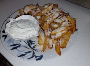O poză a rețetei Cartofi wedges la cuptor cu parmezan.