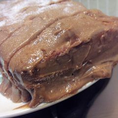 A picture of Simple Milkmaid Coffee Cake with Peanut butter mocha frosting.