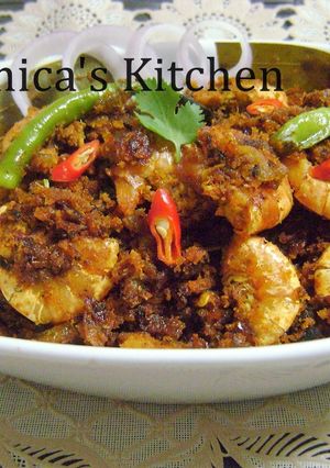 A picture of Chingri Narkel Fry (Prawn Coconut Fry - Bengali Style).