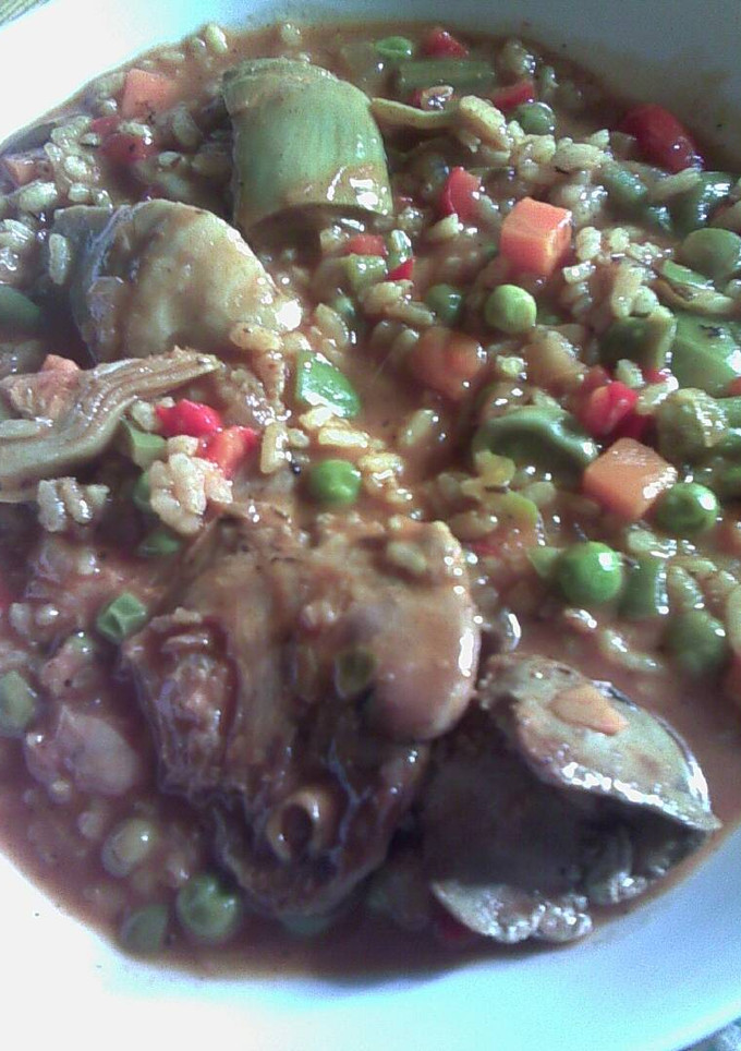 Una foto de Arroz caldoso con conejo