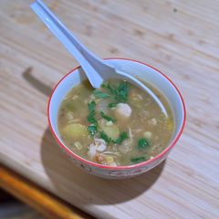A picture of Northern New Mexico Green Chile Chicken Stew with potatoes and corn.