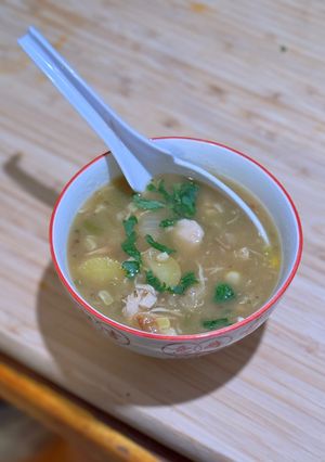A picture of Northern New Mexico Green Chile Chicken Stew with potatoes and corn.